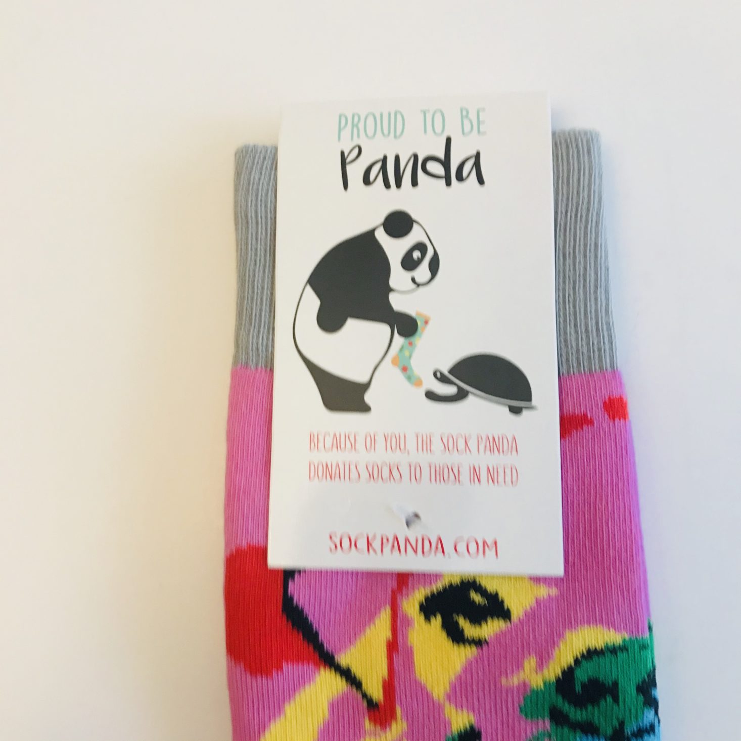 Sock Panda Women December 2019 front of tag dog face
