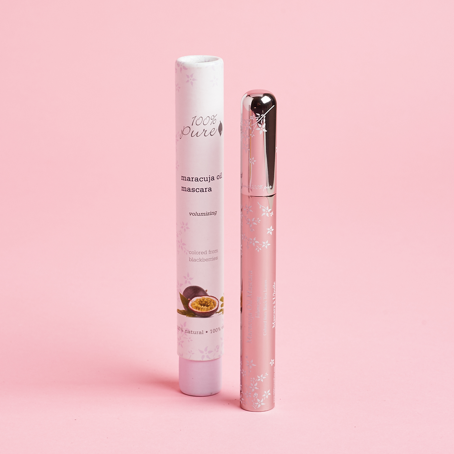 metallic tube of mascara with white tube