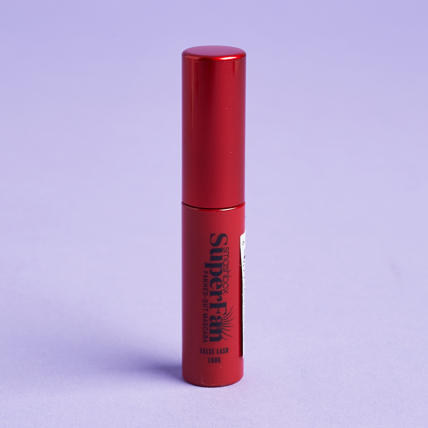 red mini tube of mascara