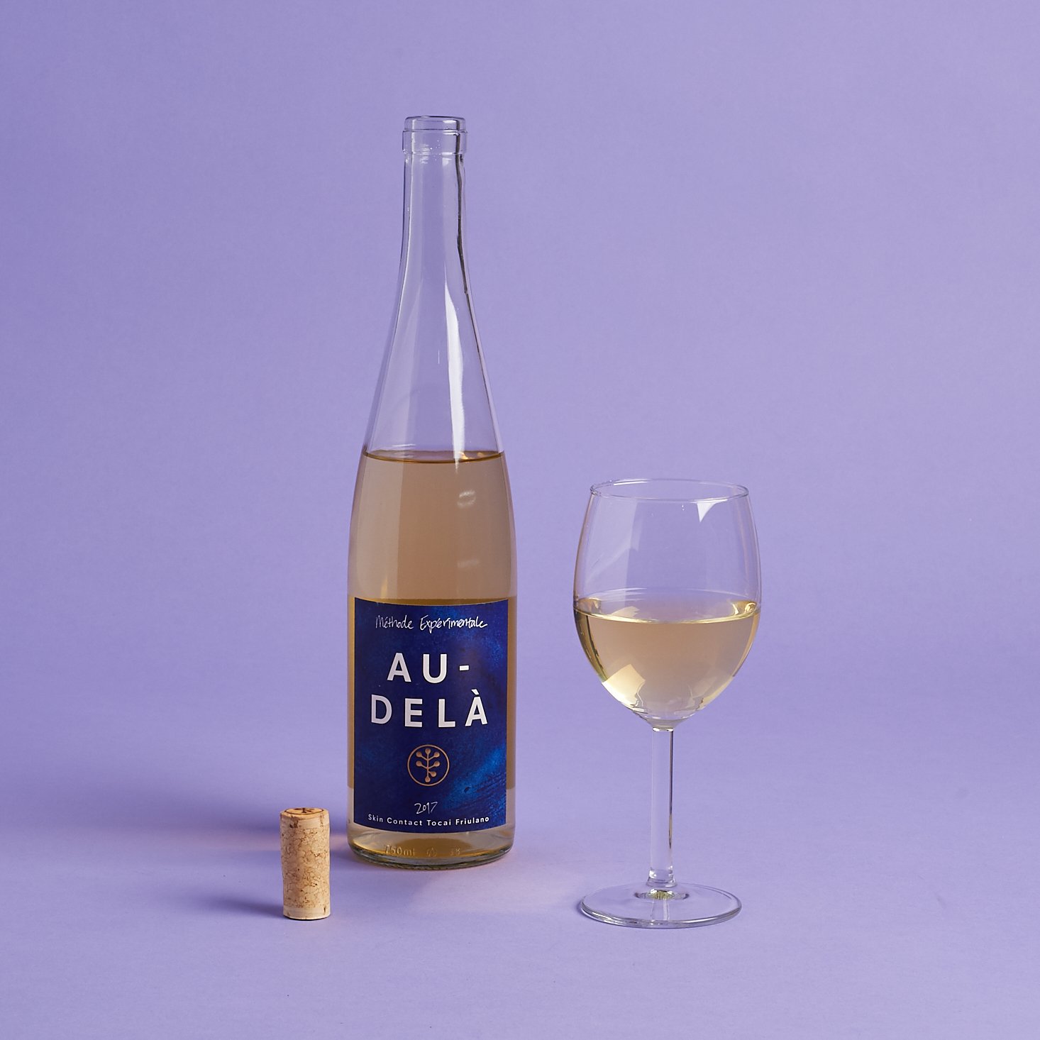 Au-Delà Semillon bottle with glass poured and upright cork