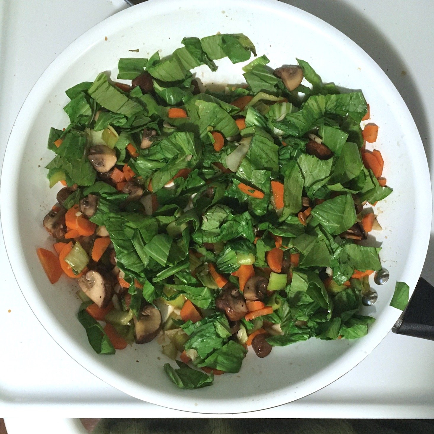 miso butter shrimp bok choy leaves in pan w: other veggies