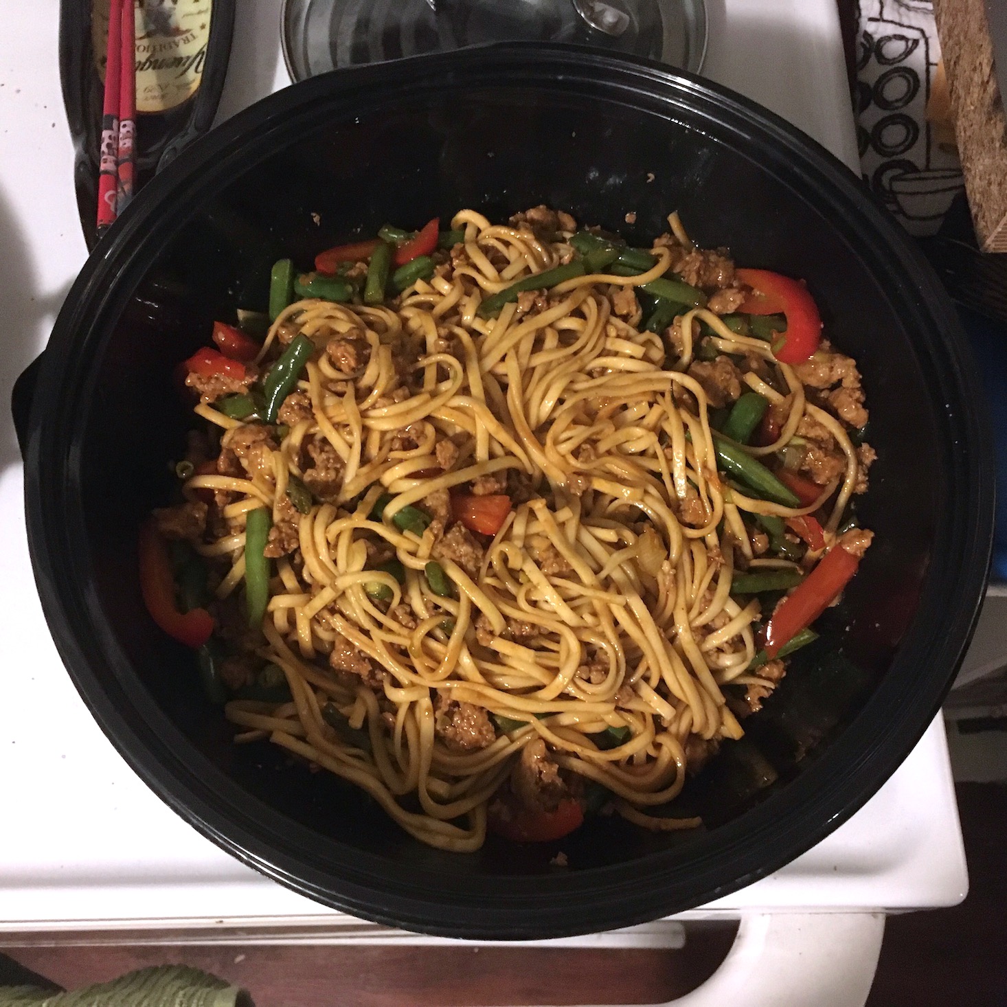 korean pork noodles all ingredients mixed in large bowl