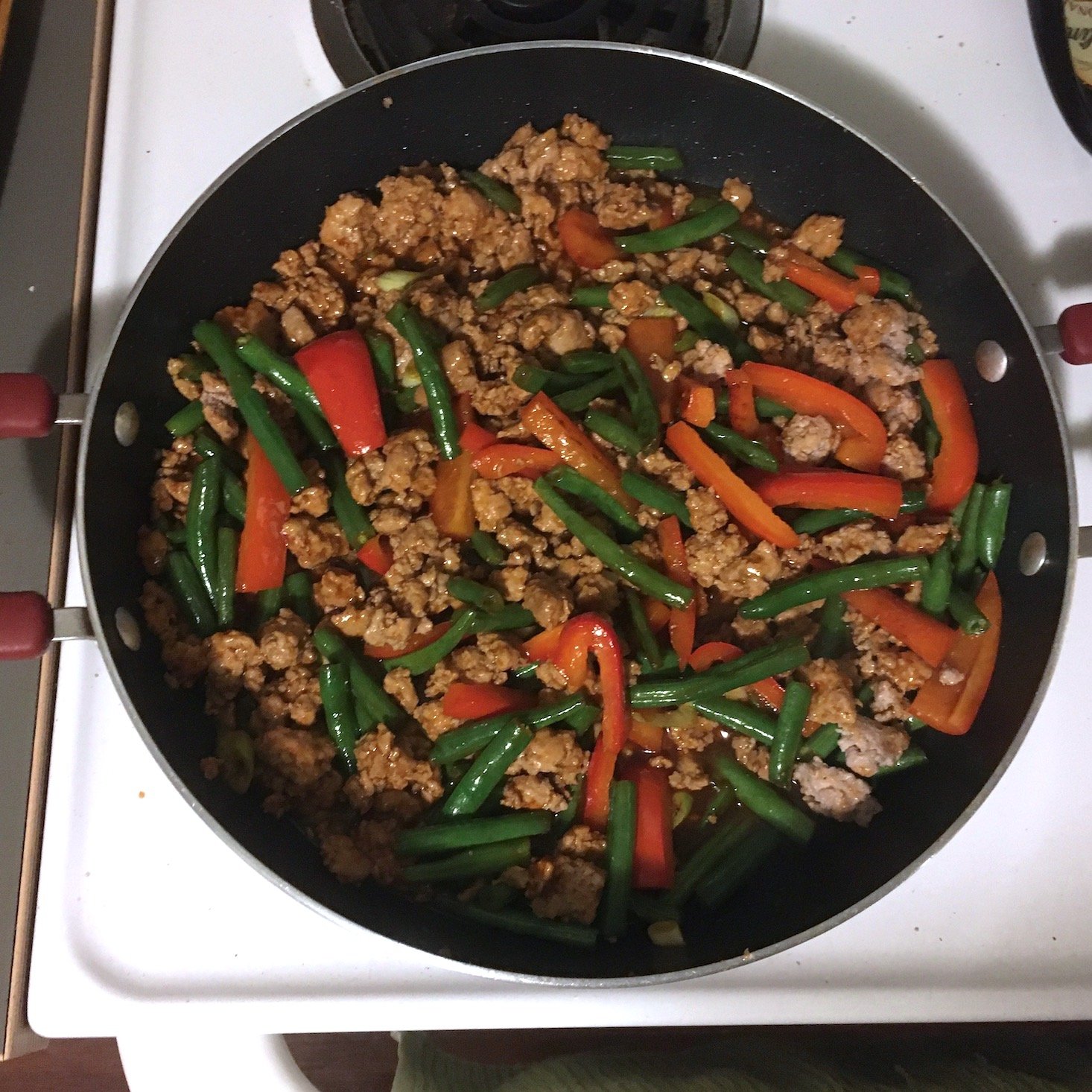 korean pork noodles all ingredients mixed together in pan