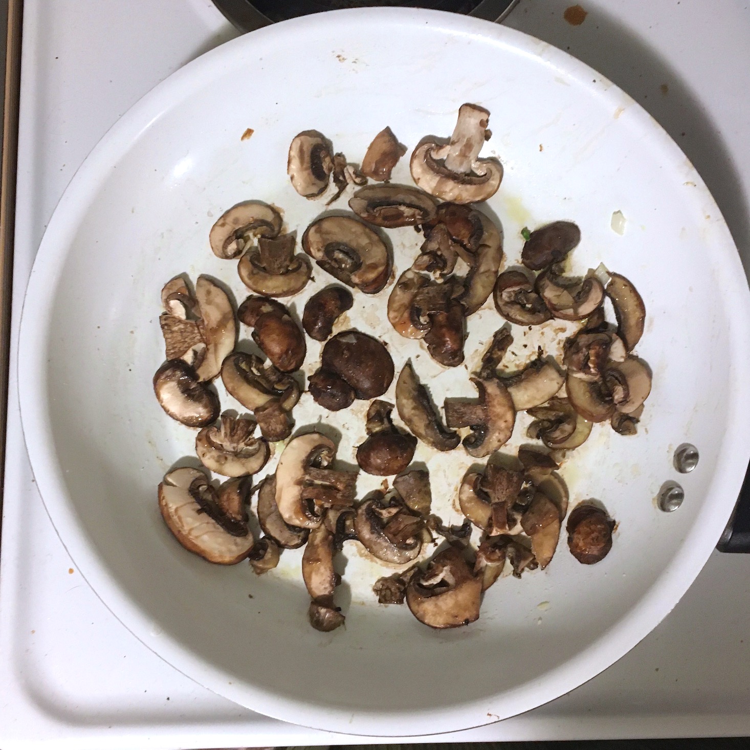 steak risotto mushrooms cooking in pan