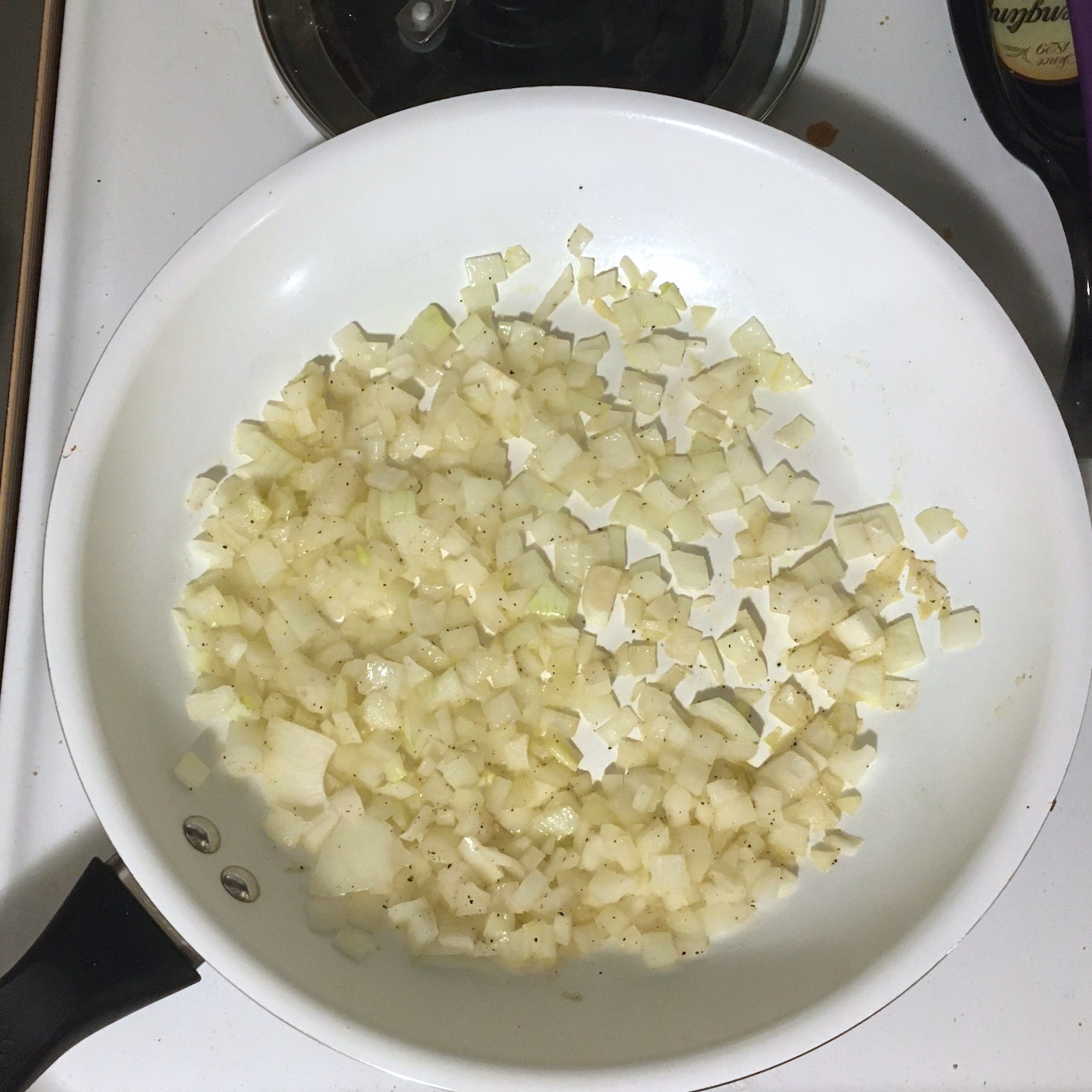 steak risotto onions cooking in pan