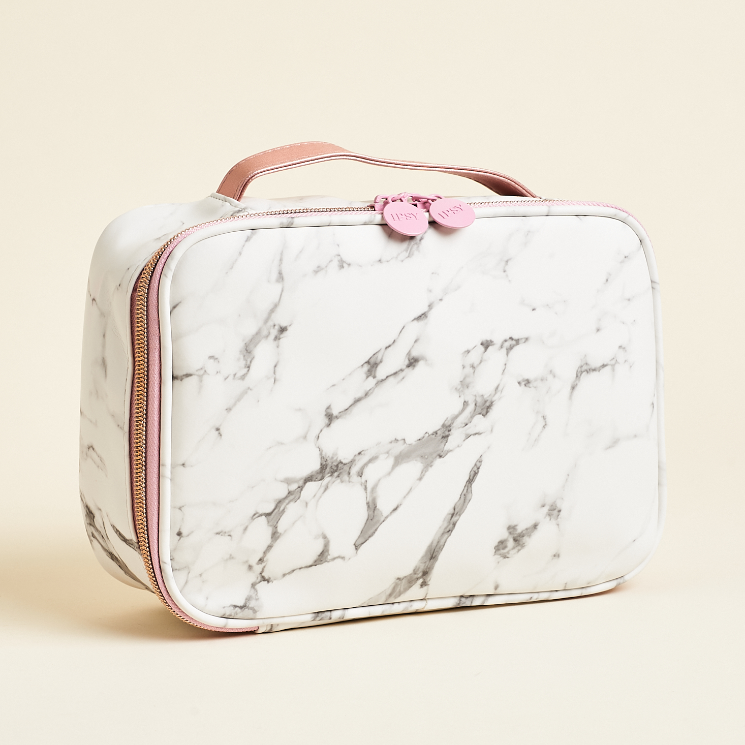 marble patterned train case with pink zipper