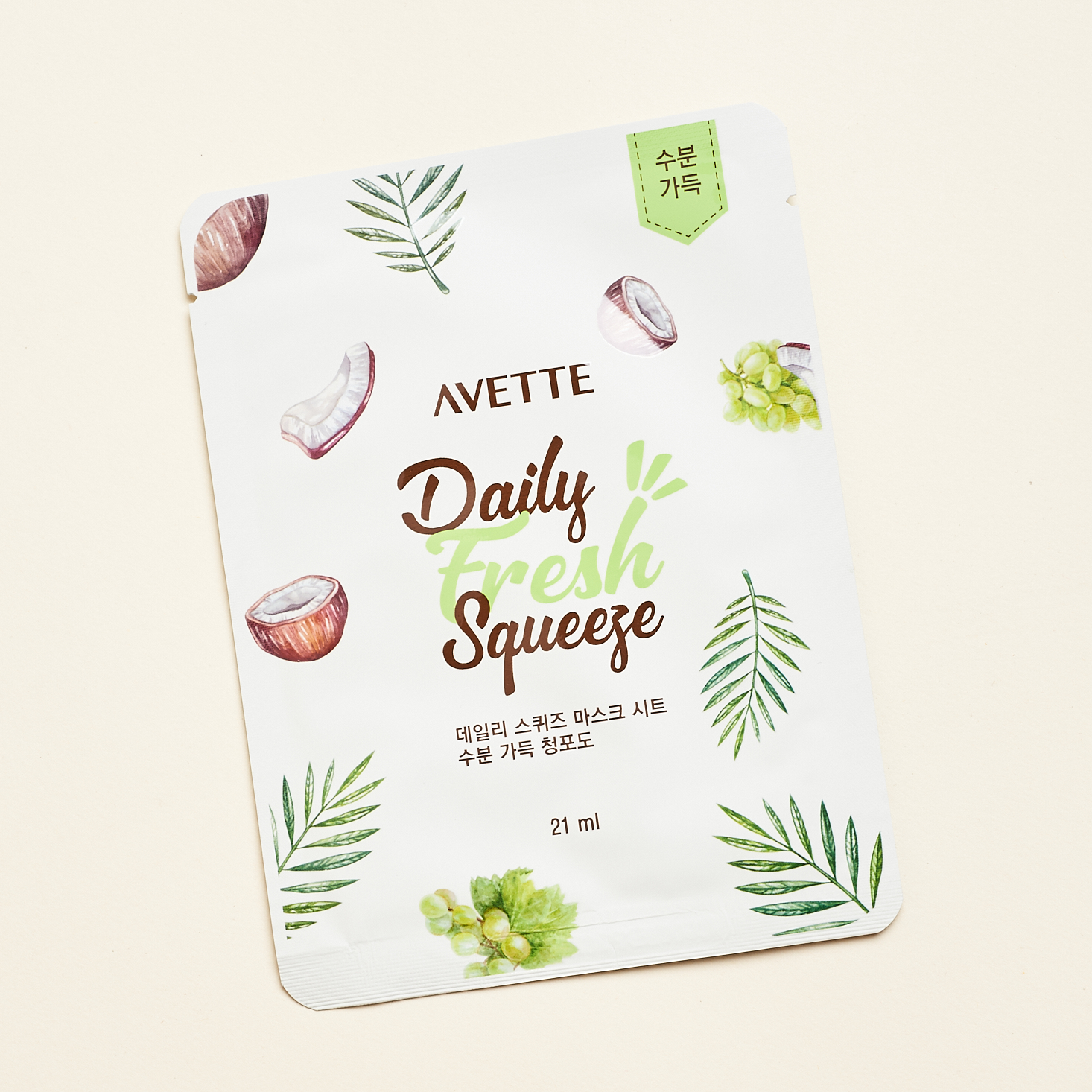 front of sheet mask with different plants on it