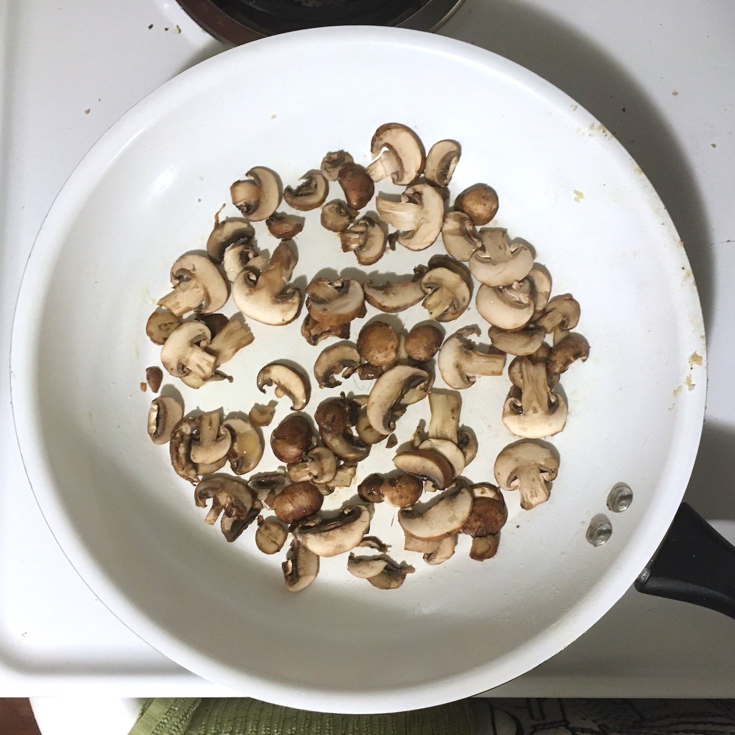 Blue Apron February 2020 - prosciutto and tomato pasta mushrooms cooking in pan