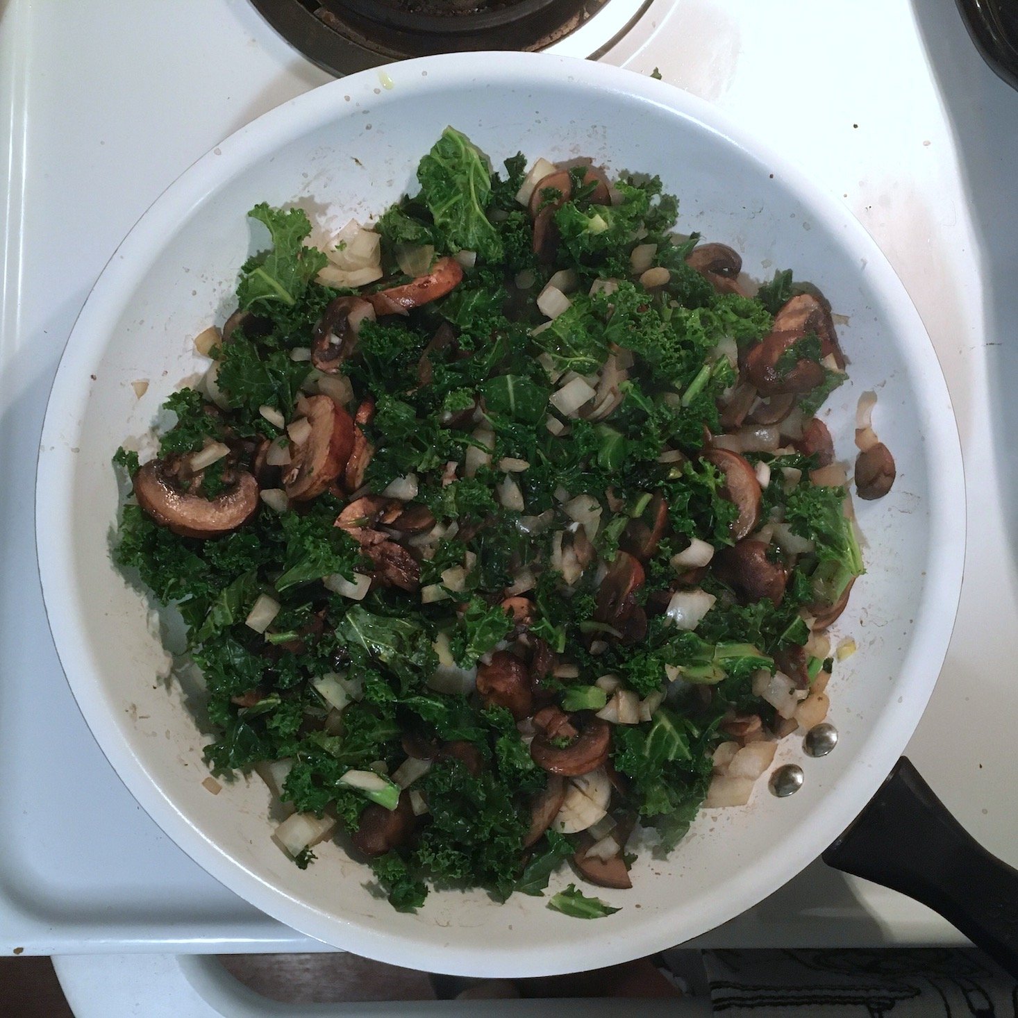 Home Chef February 2020 - mushroom and kale pie mushrooms and kale in pan