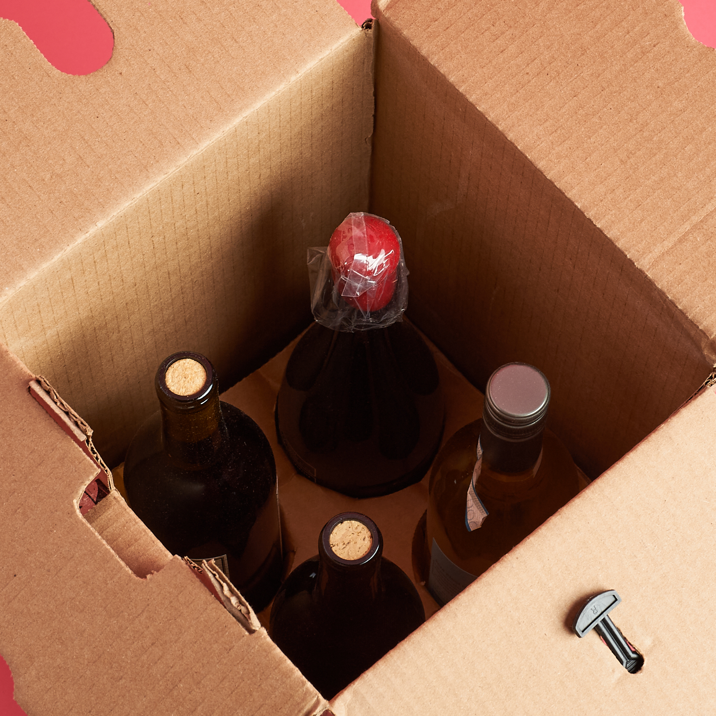 Winc February 2020 - top view of open box showing tops of bottles inside