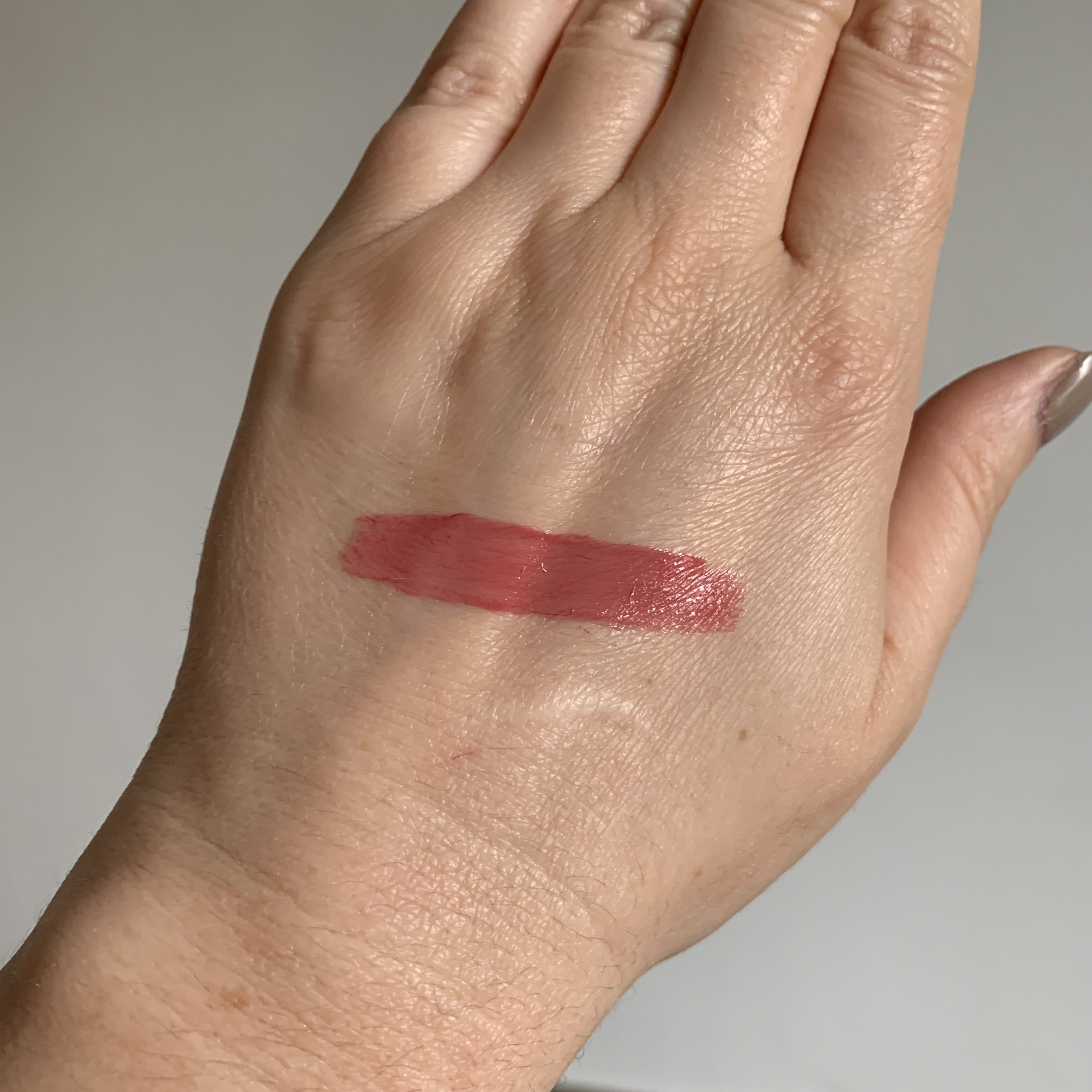 swatch of NARS Lip Gloss is Mythic Red