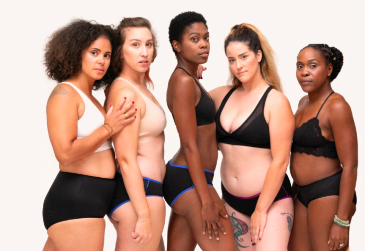 Inclusive image of five women wearing bras and Dear Kate period underwear.