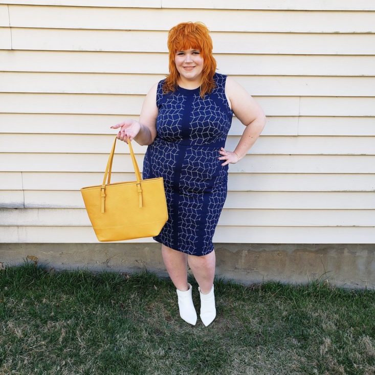 Model in Stitch Fix dress and bag.