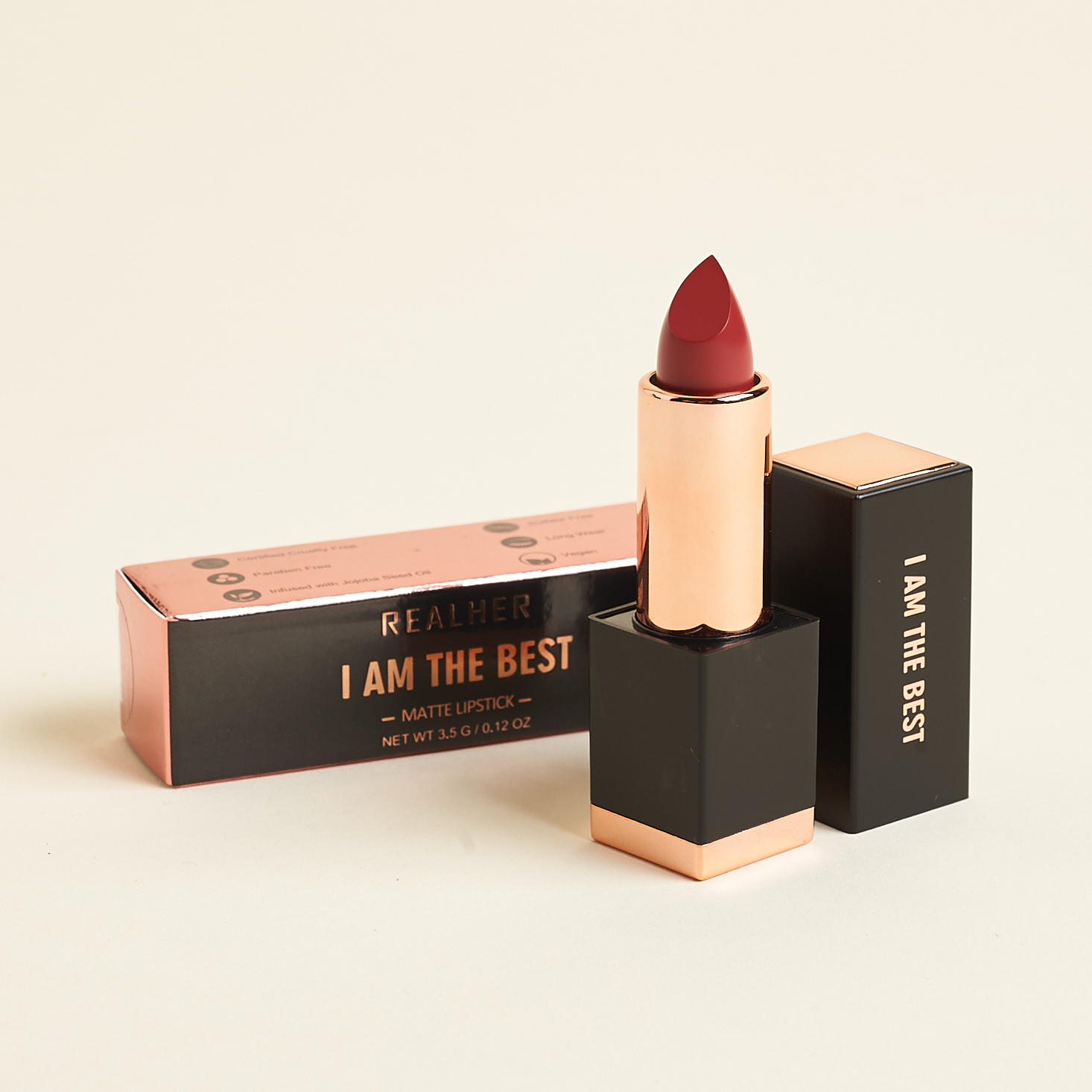 open REALHER Makeup Matte Lipstick in I Am The Best with box