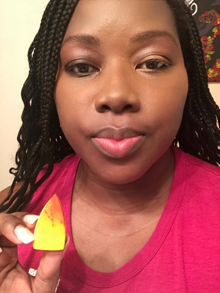 Boxycharm Tutorial April 2020 - Showing Concealer Blended in Holding the Smaller Sponge In My Hand