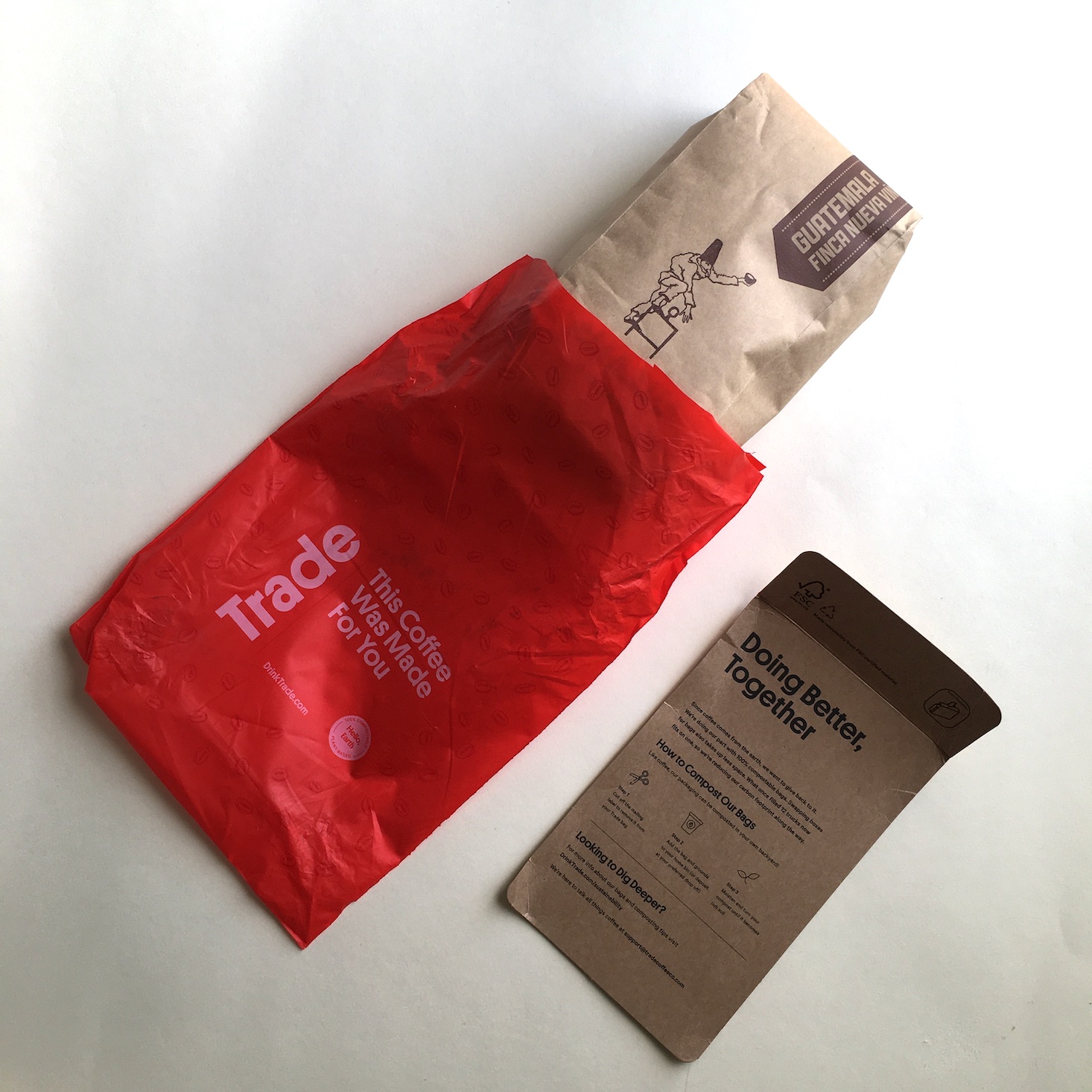 Trade coffee shipment featuring compostable packaging and recyclable instructions.