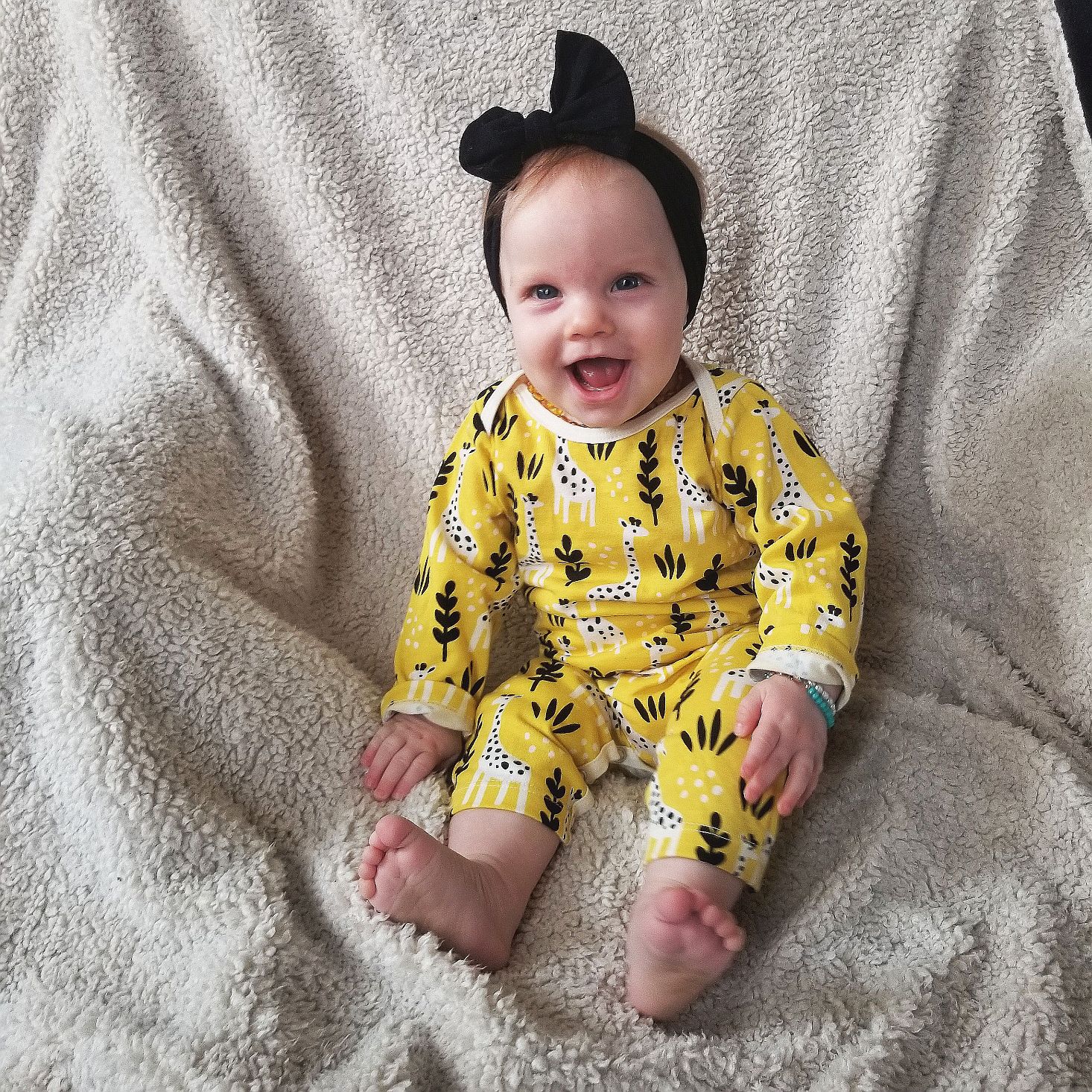 Surprisly April 2020 yellow onesie modeled