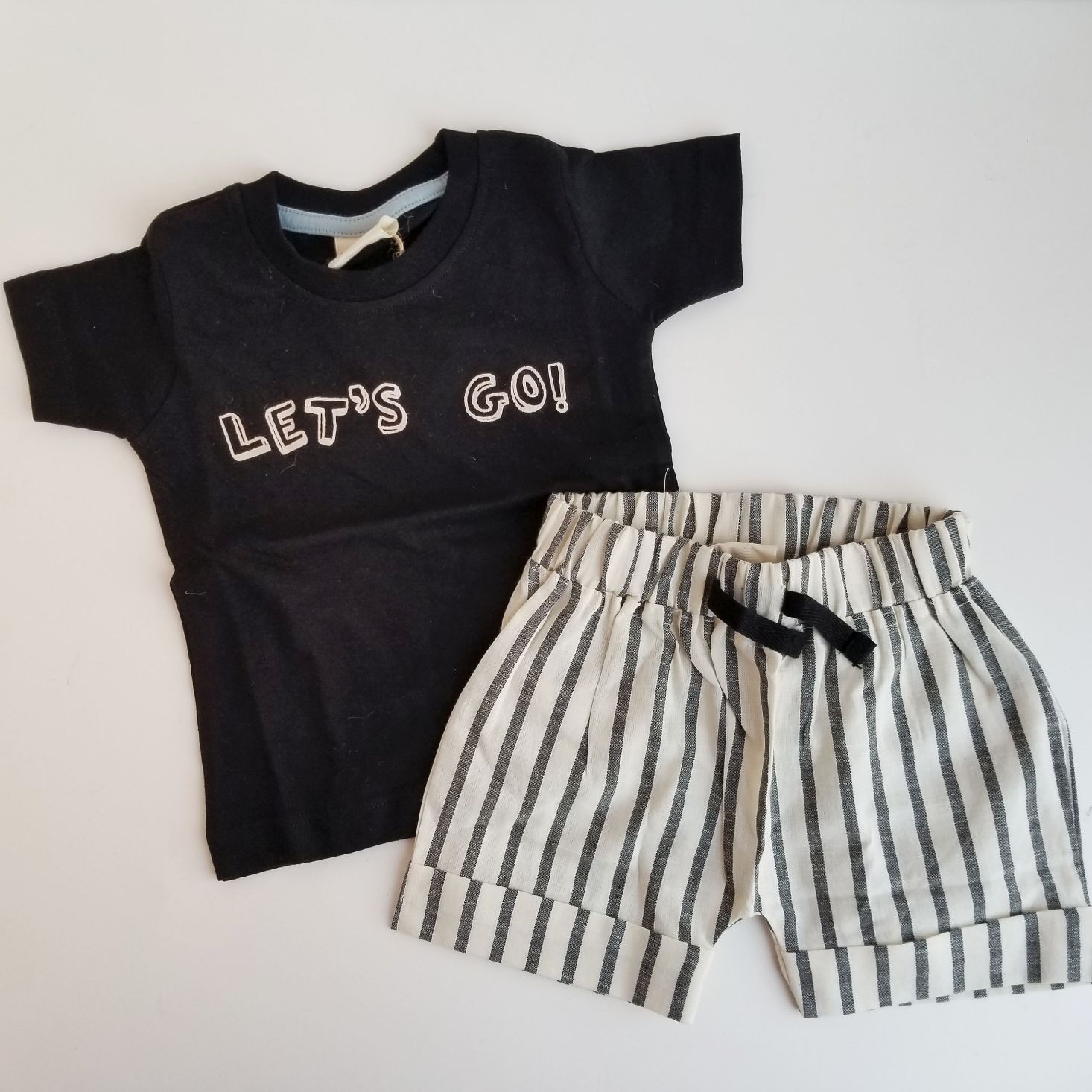 Suprisly May 2020 tee + shorts flat lay