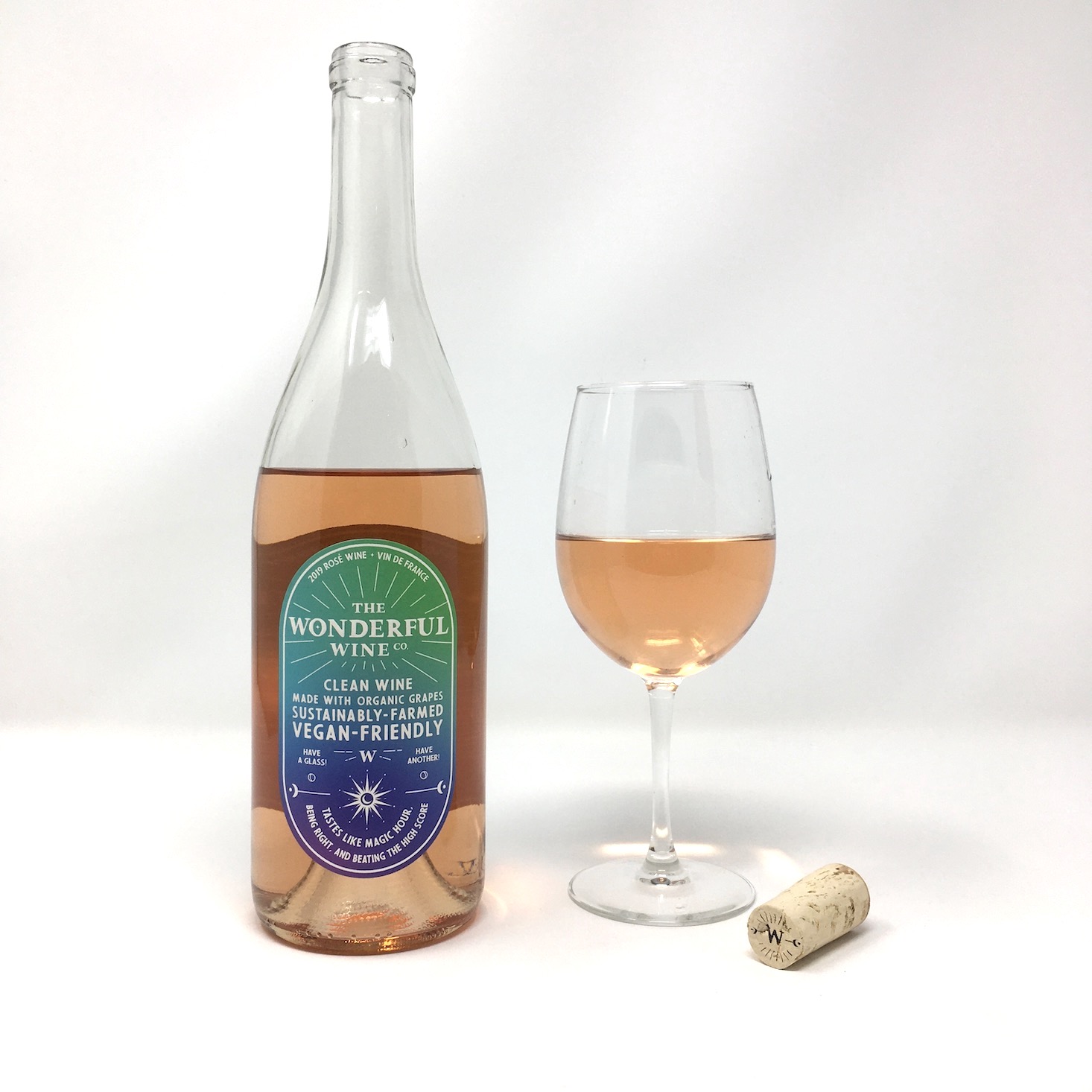 wonderful wine co rosé poured glass next to bottle and cork