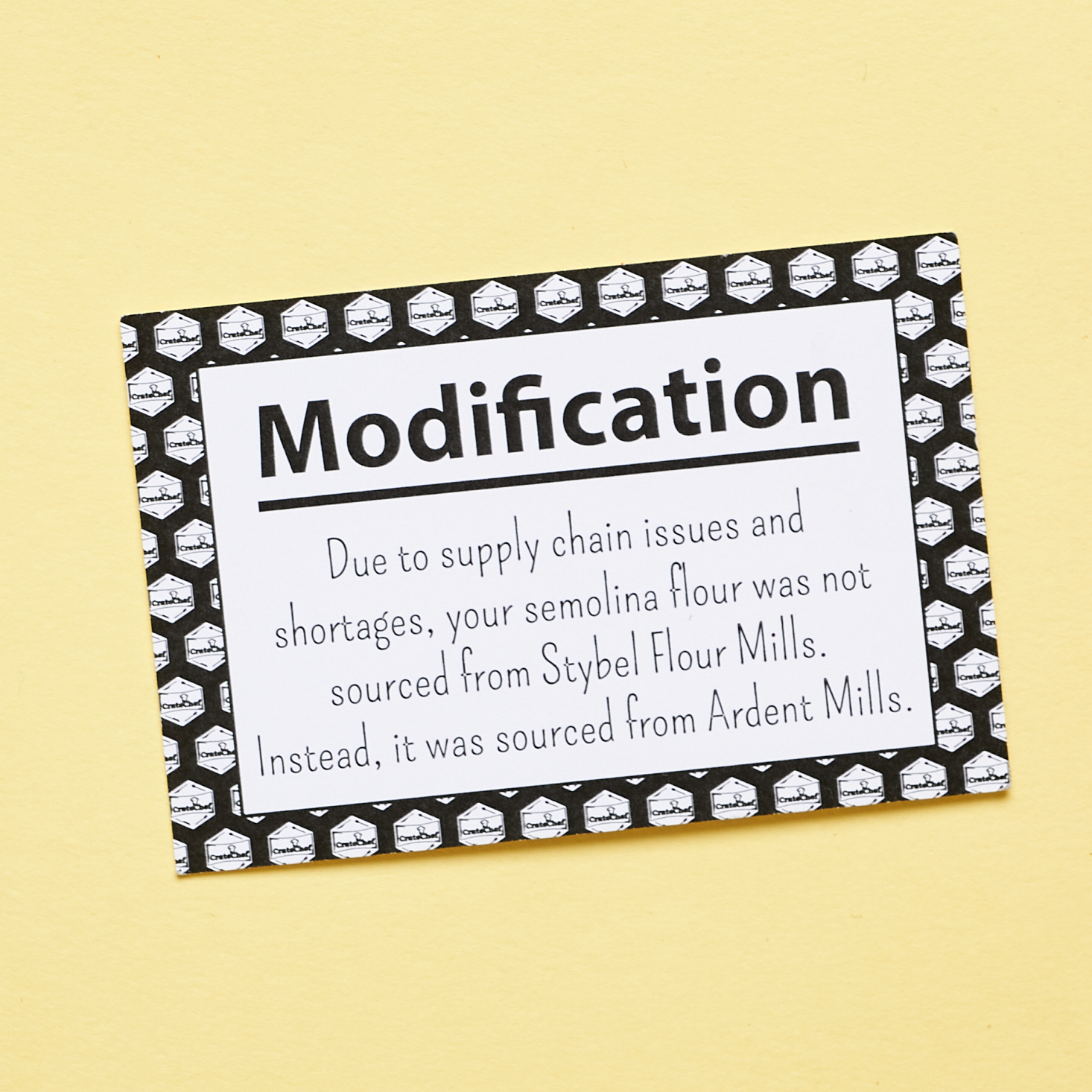 A card noting that the original flour they tried to source was out of stock and had to be switched to a different brand.