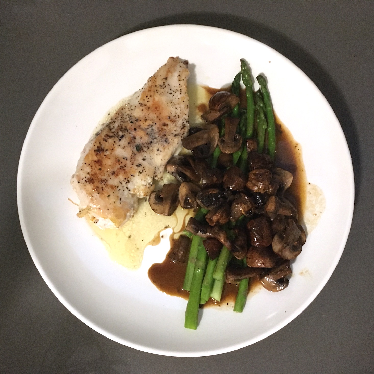 truffle butter chicken plated on white plate, top view