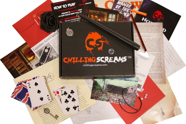 Chilling Screams spooky game night subscription with contents unpacked.