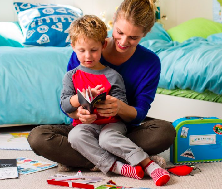 Mom and son learning with Little Passports