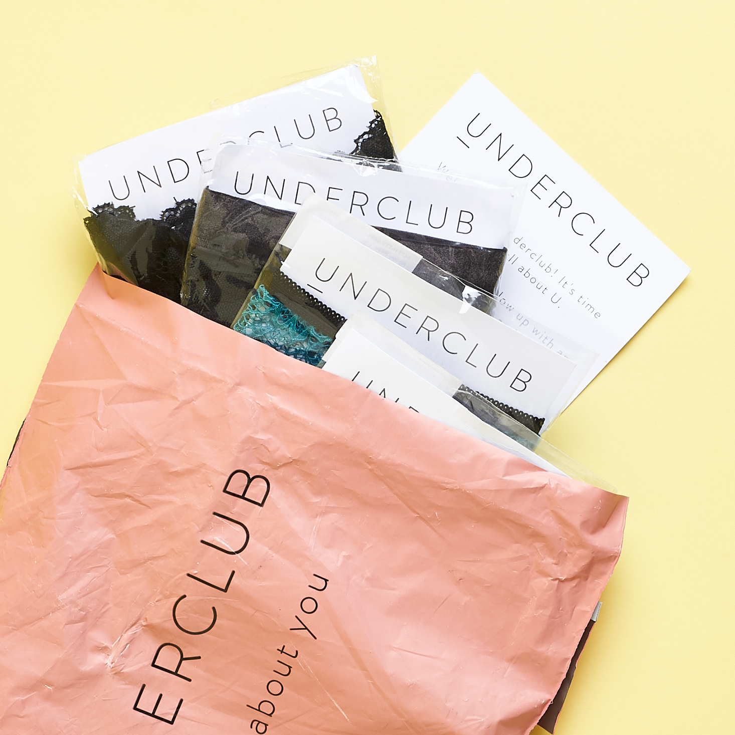 Underclub mailer pouch with contents peeking out