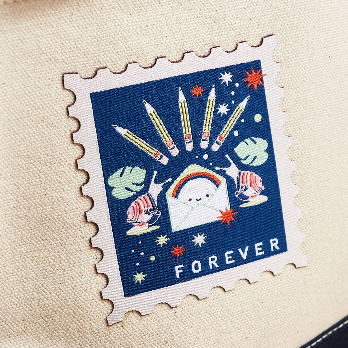 close-up of stamp patch on canvas pouch from PostBox March 2021