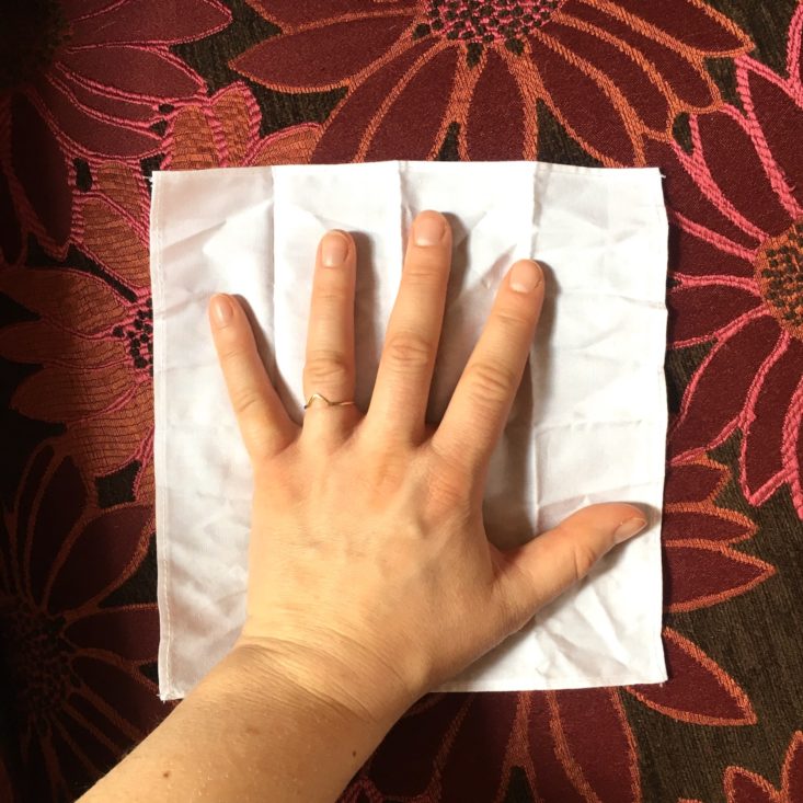 LastTissue size with hand for scale