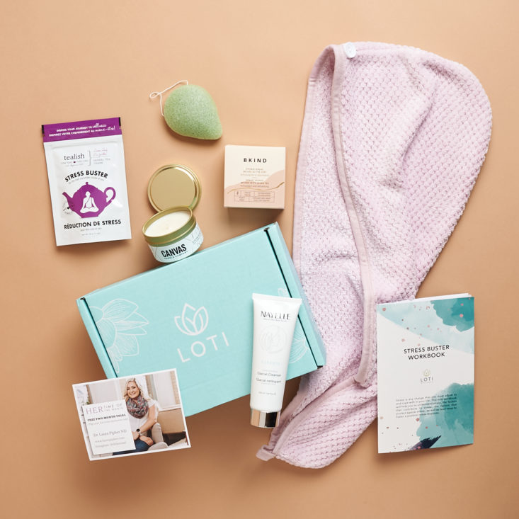 loti wellness box surrounded by items from the box