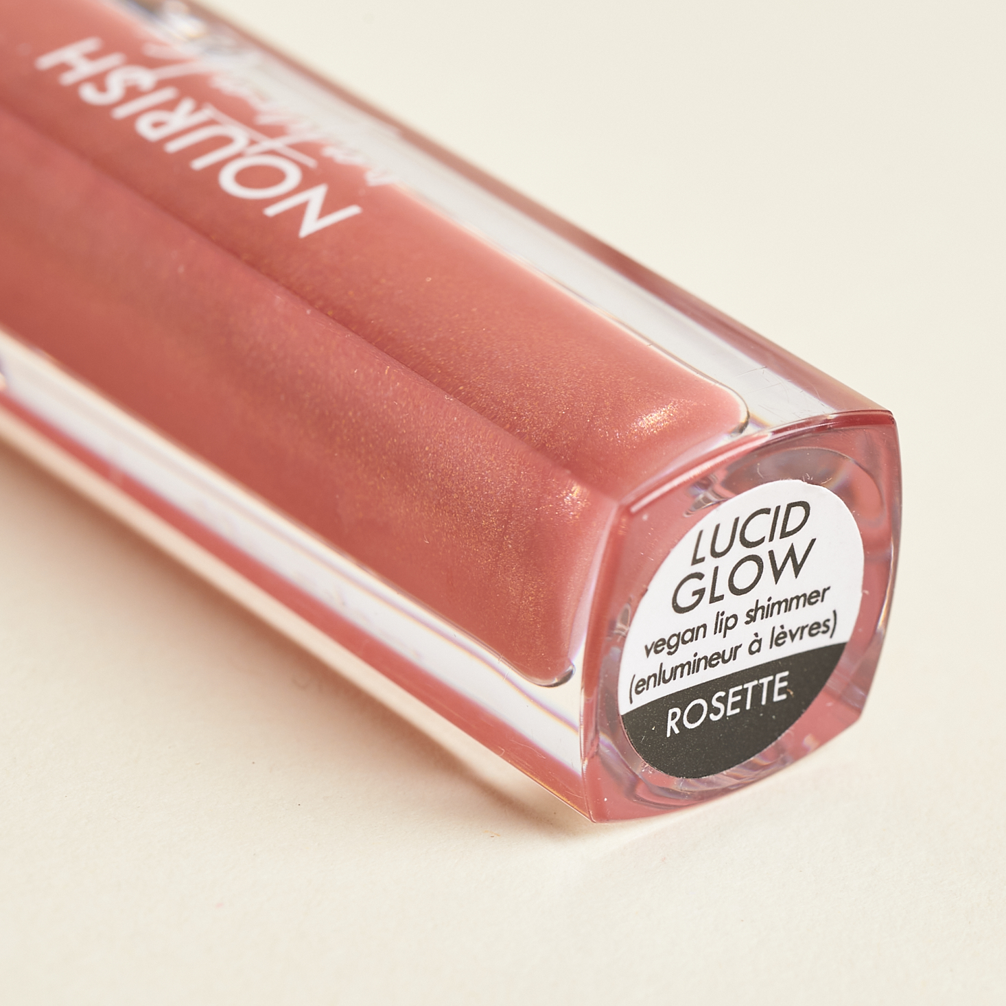 Nourish Naturals Lucid Glow Lip Shimmer in Rosette Close-up for Nourish Beauty Box April 2021