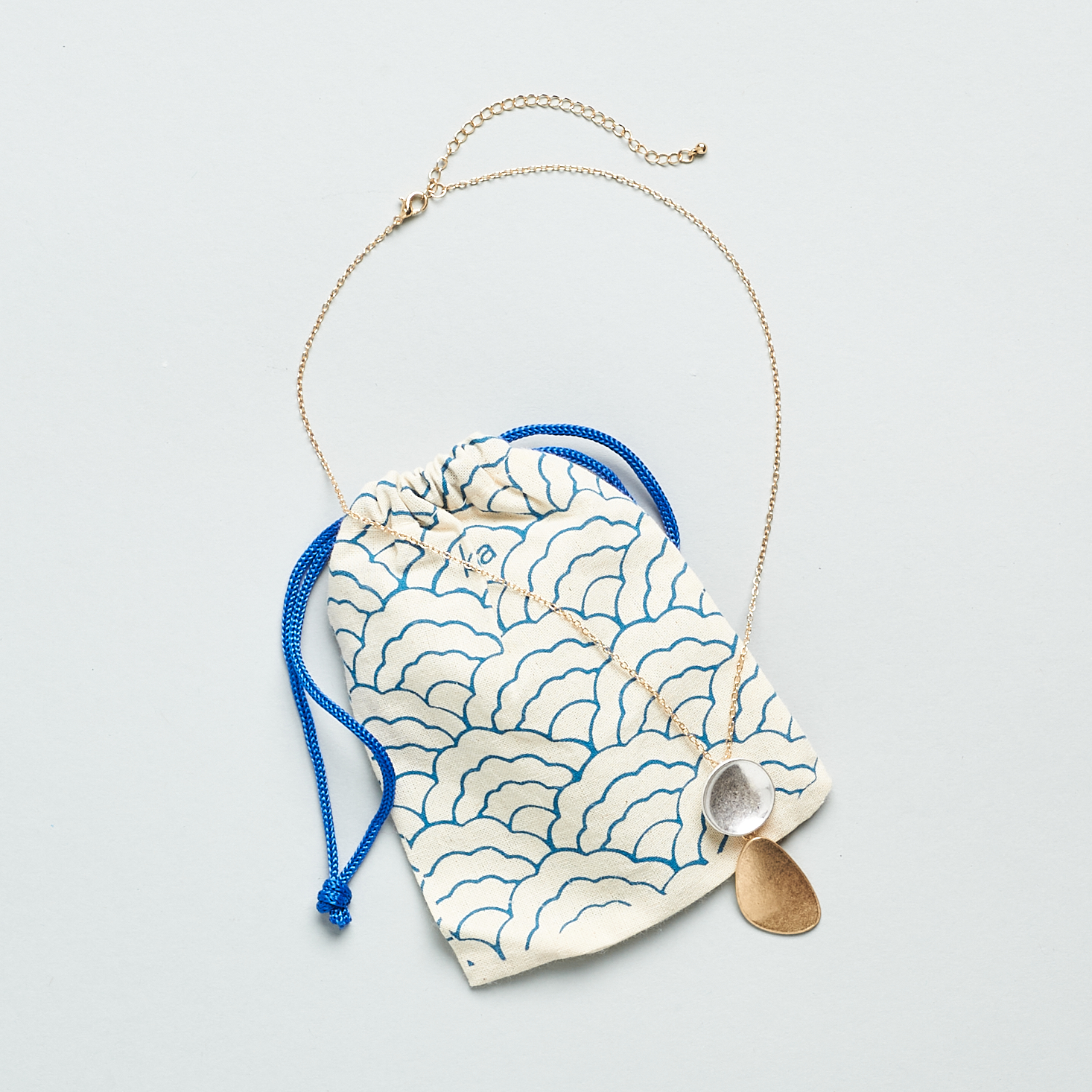 necklace and pouch from JourneeBox Spring 2021