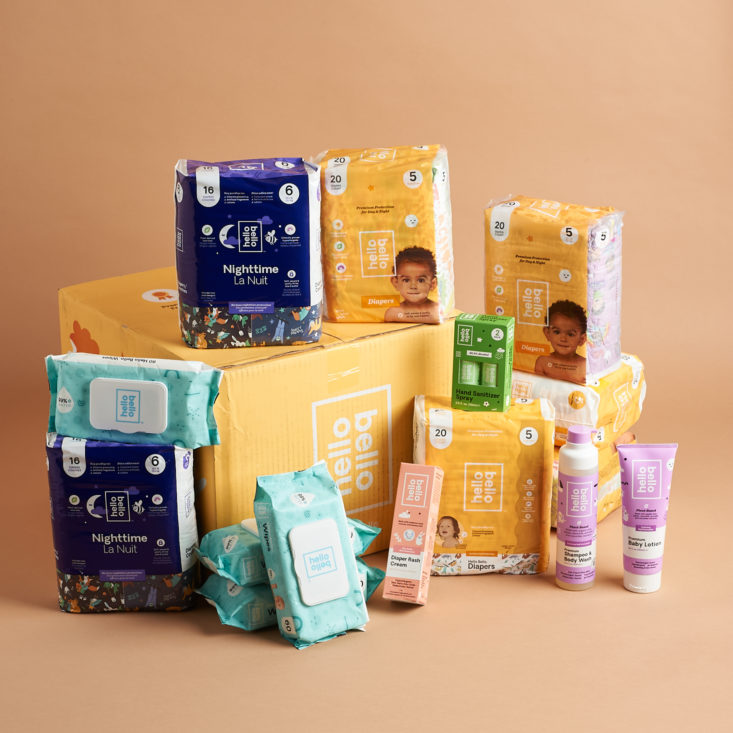 Hello Bello subscription box surrounded by diaper packages, wipes, and diaper cream