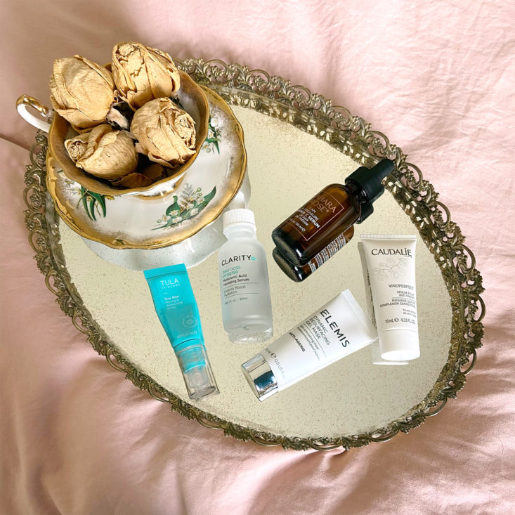 mirrored trinket tray with sample size skincare products