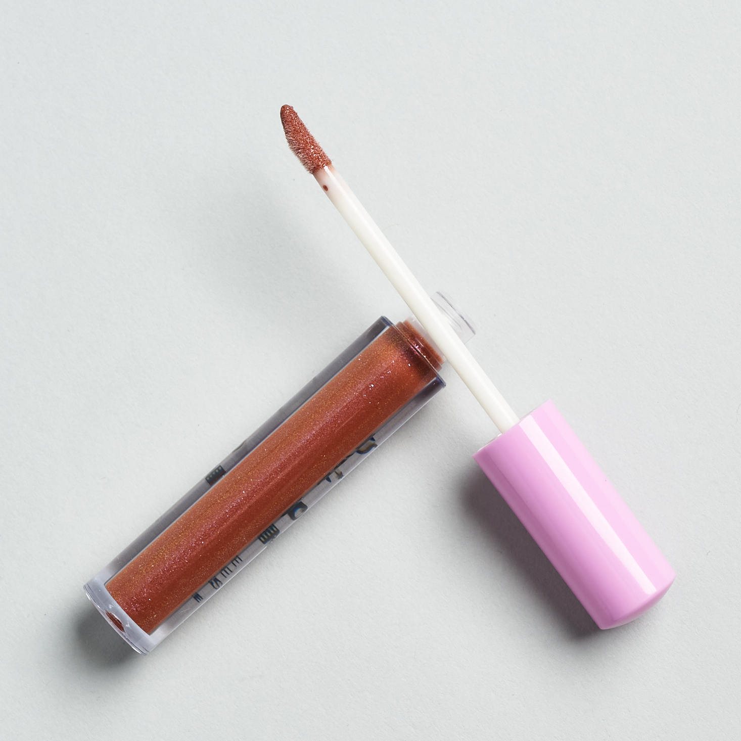 Unscrewed lipgloss.