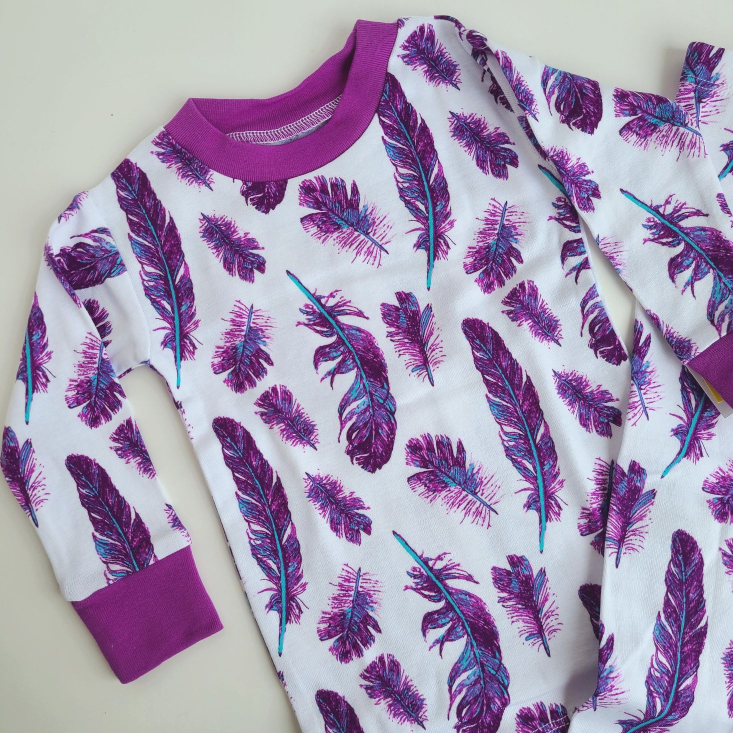 purple two-piece pajama print close up