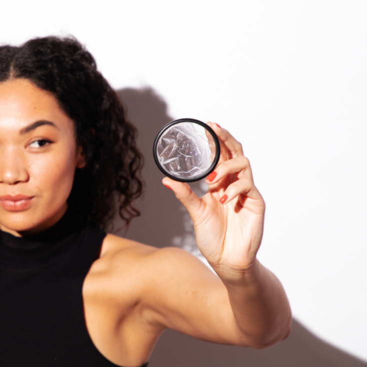 Woman holding a FLEX disc