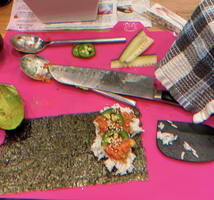 knife, seaweed nori paper, sushi ingredients on surface