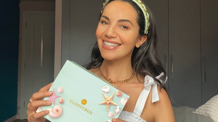 woman holding a glossybox