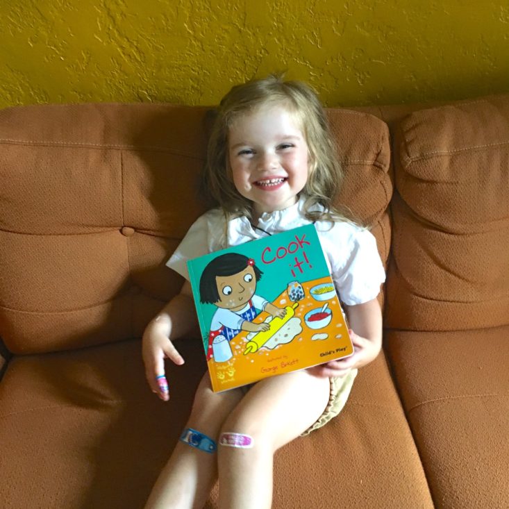 child reading book from Little Feminist