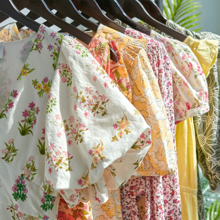 Photo of women's clothing on hangers