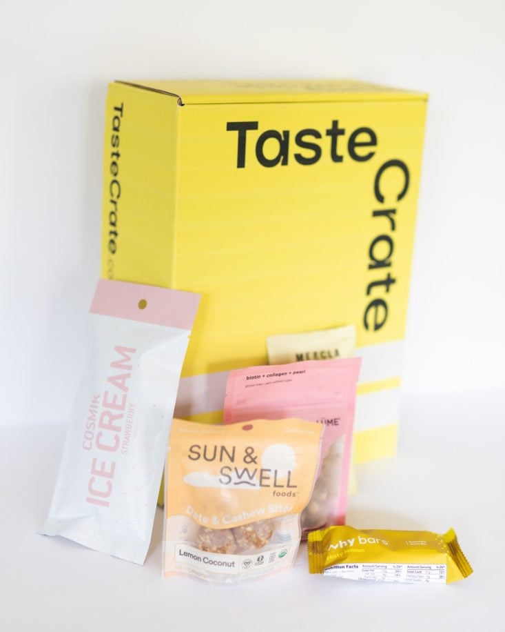 Taste Crate yellow box with snacks on outside of box