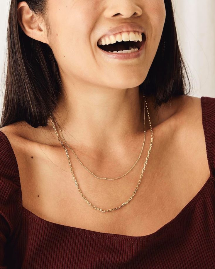 Photo of a woman wearing EACH Jewels Layering Necklace Set