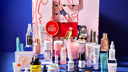 box with cult beauty products around it on a blue background