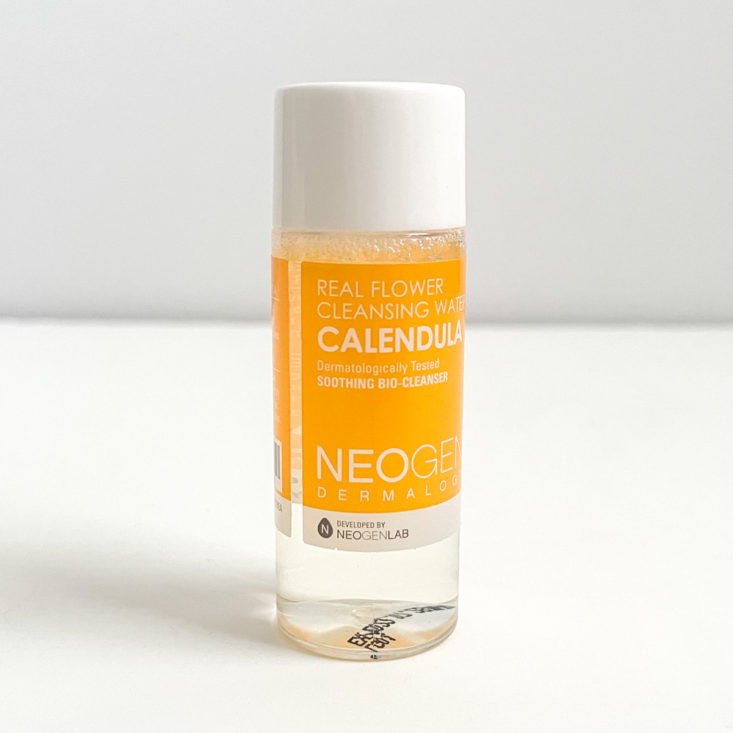 sample of Neogen cleansing water with yellow label