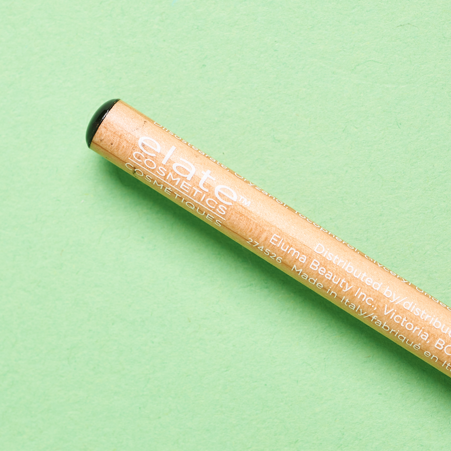 close up of wood packaging of eyeliner