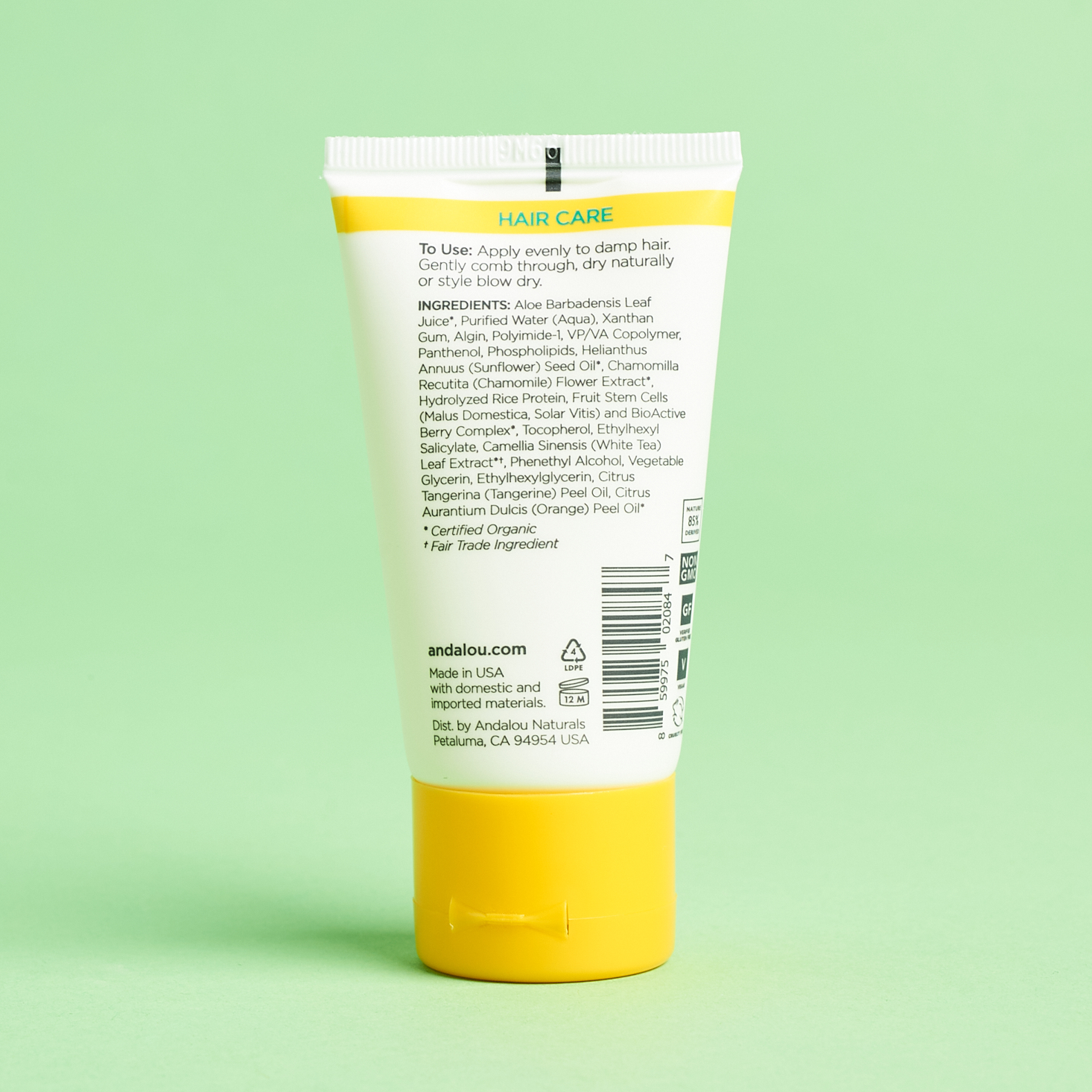 yellow and white shower gel packaging with black lettering listing the ingredients