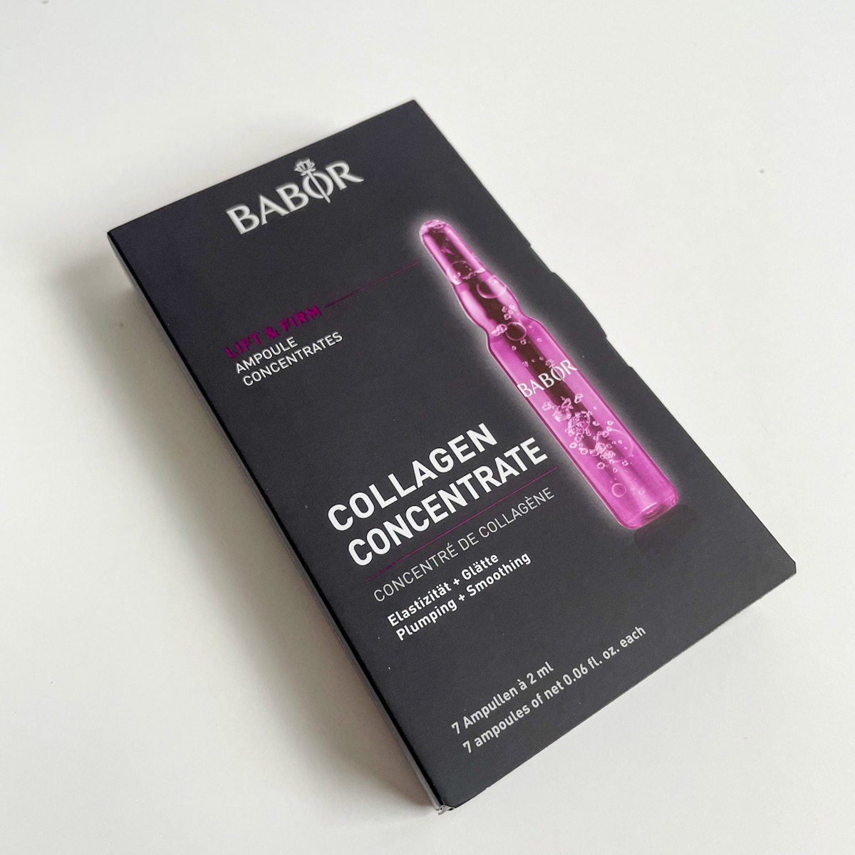 black and purple packaging of collagen ampoules