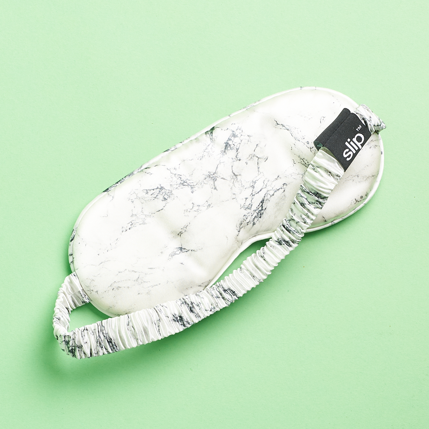 alternate view of black and white marbled sleep mask